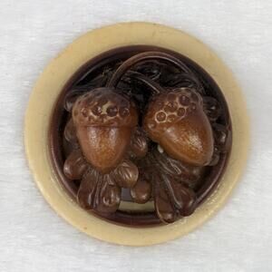 Marion Weeber 1.625" Carved Acorn Celluloid Button Glued to Cream Buckle Base